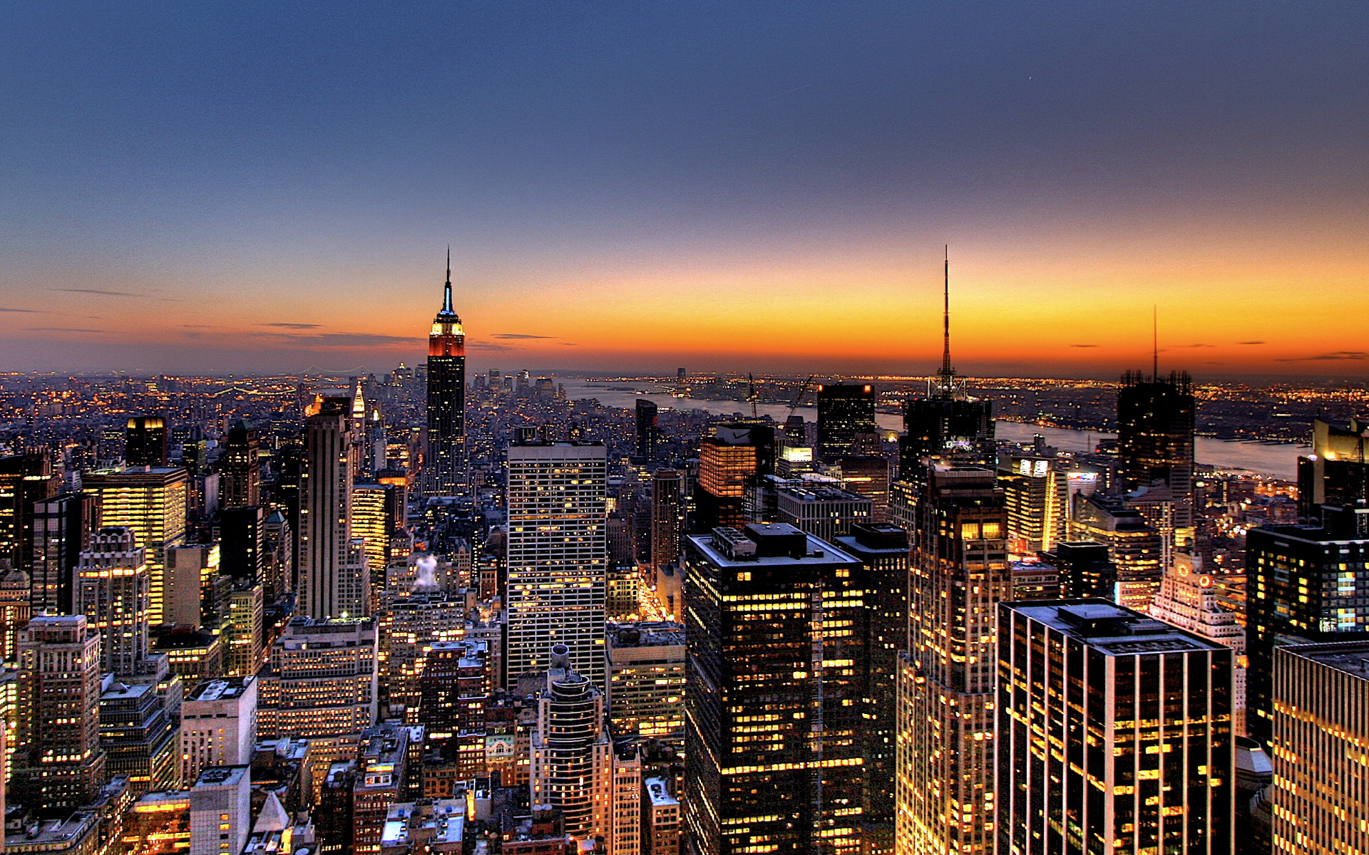 New York City skyline at sunset — Synergy Limousine luxury car service NYC inbound outbound trips to NJ CT MA PA RI
